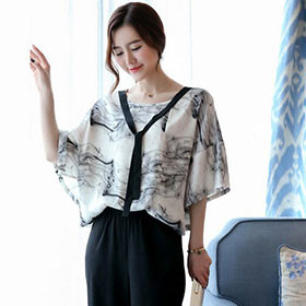 夏日不再依赖空调  露肩露背花样层出不穷